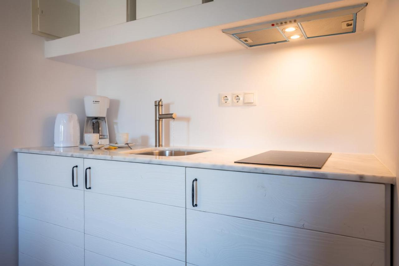 Milia Gi Suites Pollonia Bagian luar foto